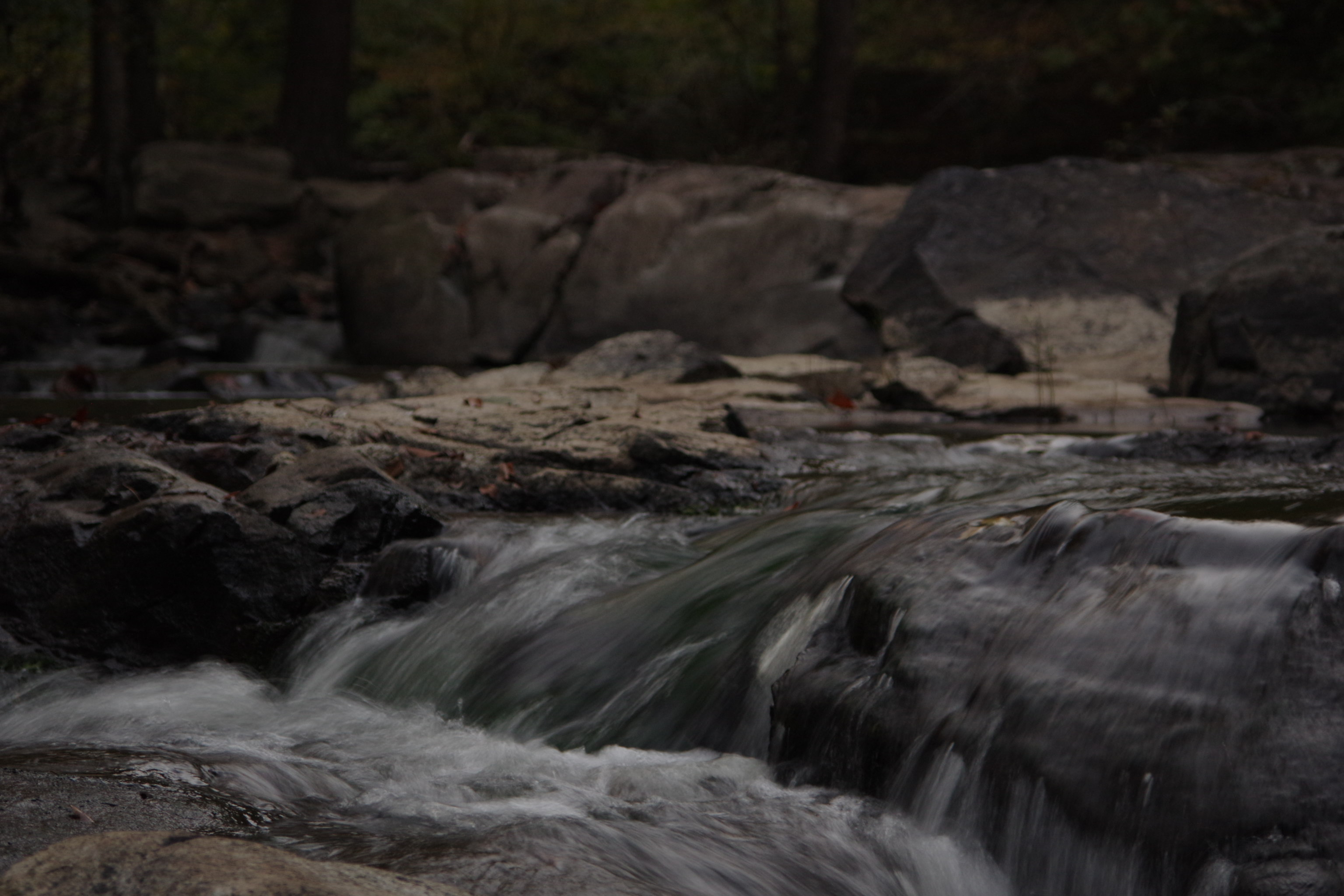 Running water over rocks